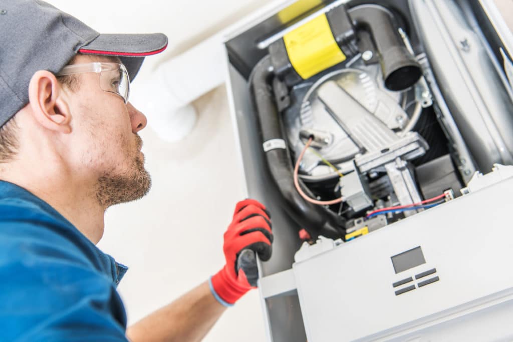 Technician checking the Heater Issue